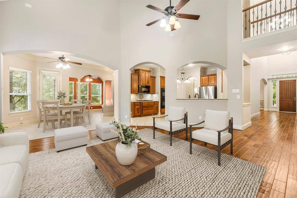 Open floor plan shows open to kitchen, breakfast and extra flex room, Virtually Staged