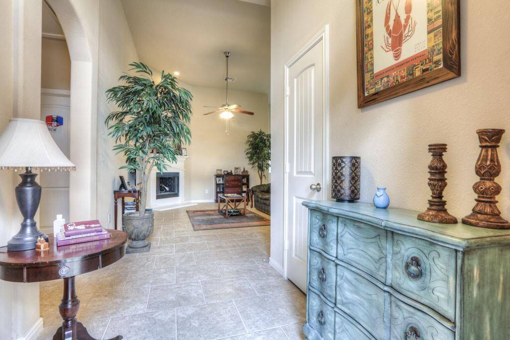 Step inside this beautiful one story home. Extensive tile flooring except for carpet in the bedrooms.