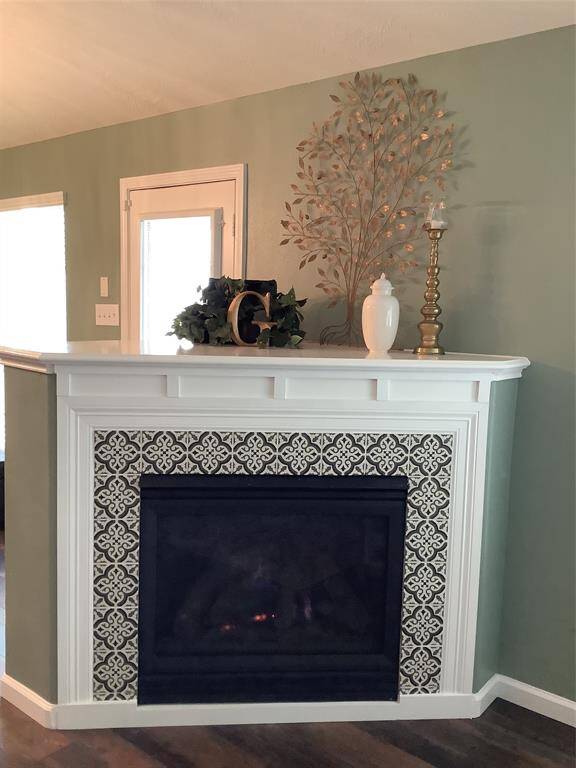 Gas log fireplace with remote control.