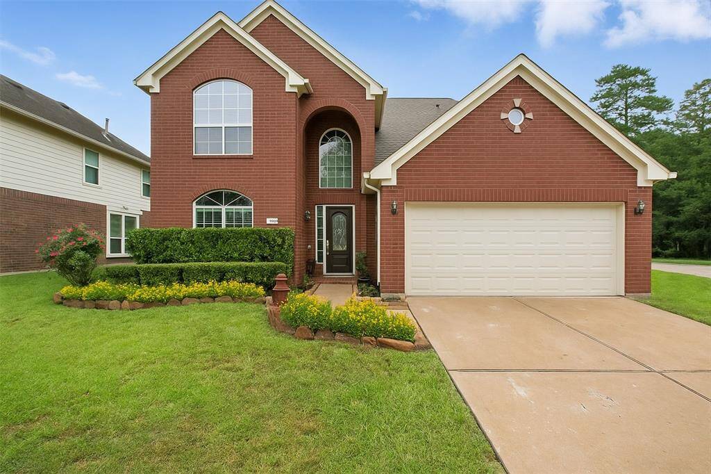 Charming two-story brick home with great curb appeal! Features include a welcoming covered entry, a two-car garage, and a beautifully maintained front yard with manicured hedges and flowerbeds. The tall arched window above the entry adds elegance and brings in natural light. A clean driveway and tidy landscaping complete the inviting exterior.