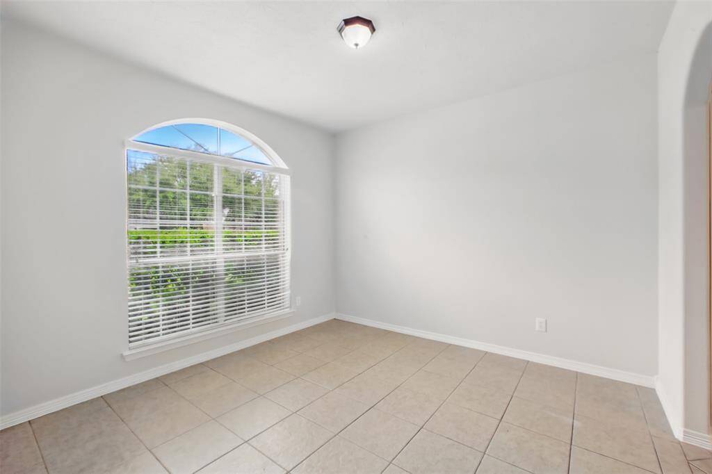 Enjoy meals in this dining room that flows seamlessly to the kitchen.