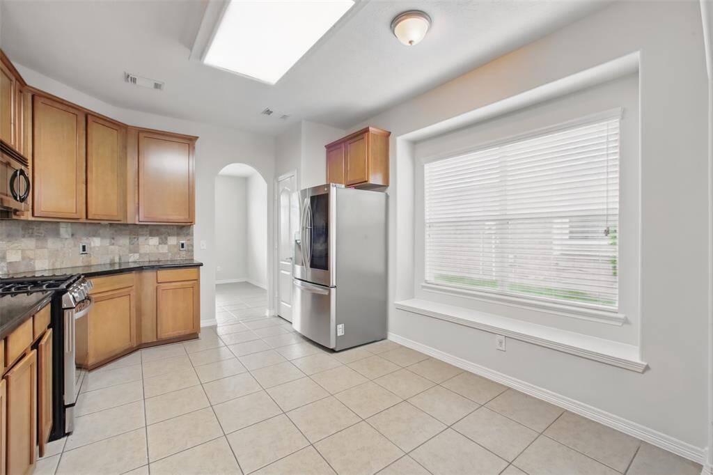 How great is the huge window with a bench seat? It brightens up the space so nicely.
