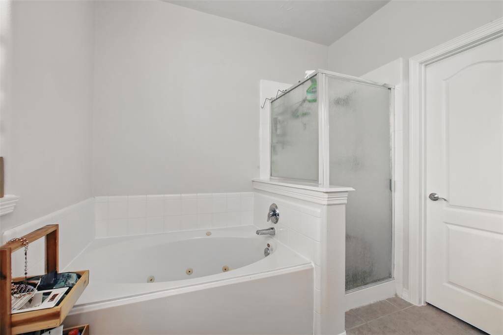 Unwind after a long day and take a soak in your new jetted tub.