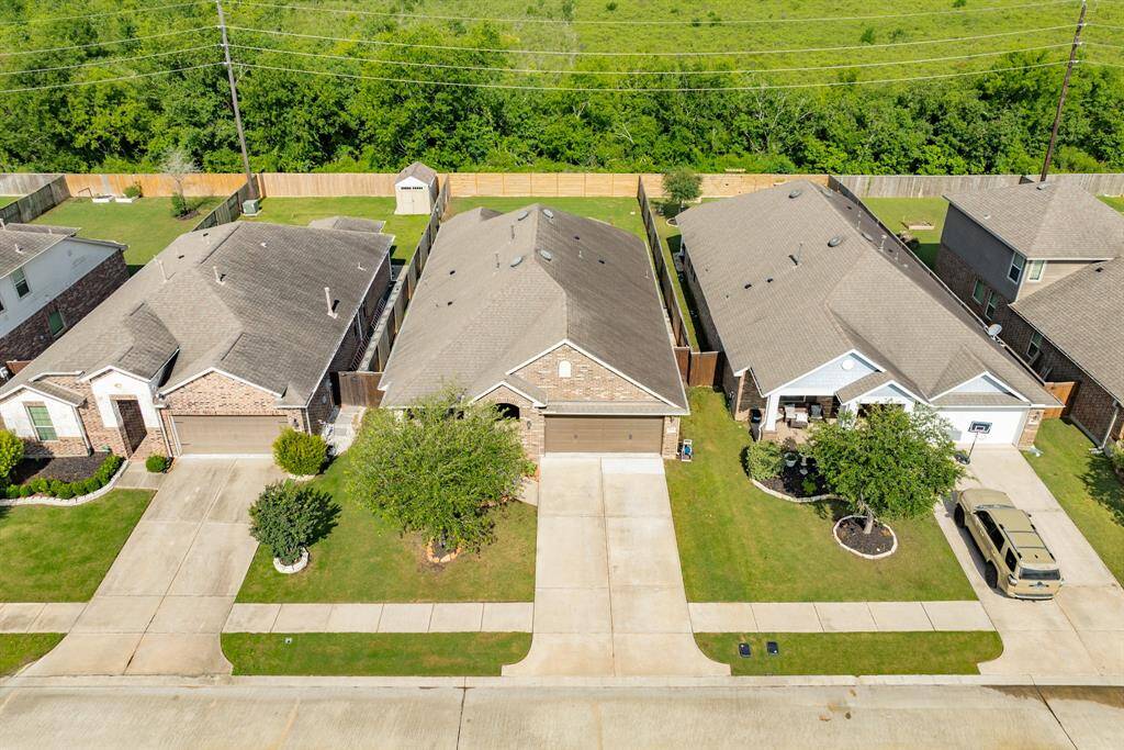 this aerial shows the green space and no back neighbors