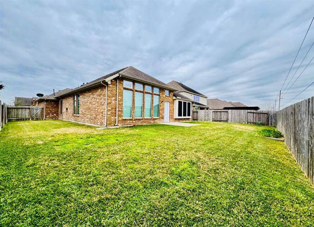 Expansive backyard perfect for entertaining and relaxation.
