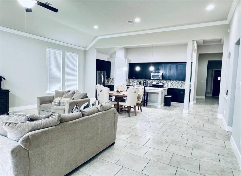 Enjoy seamless elegance with tile flooring throughout the entire home.