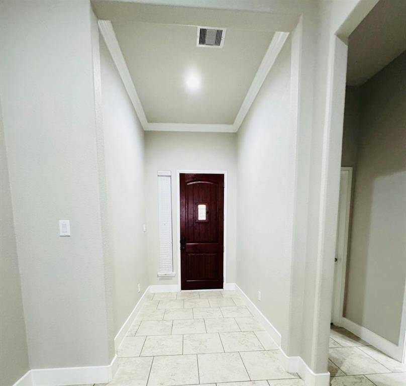 A welcoming and elegant entrance sets the tone for this beautiful home.