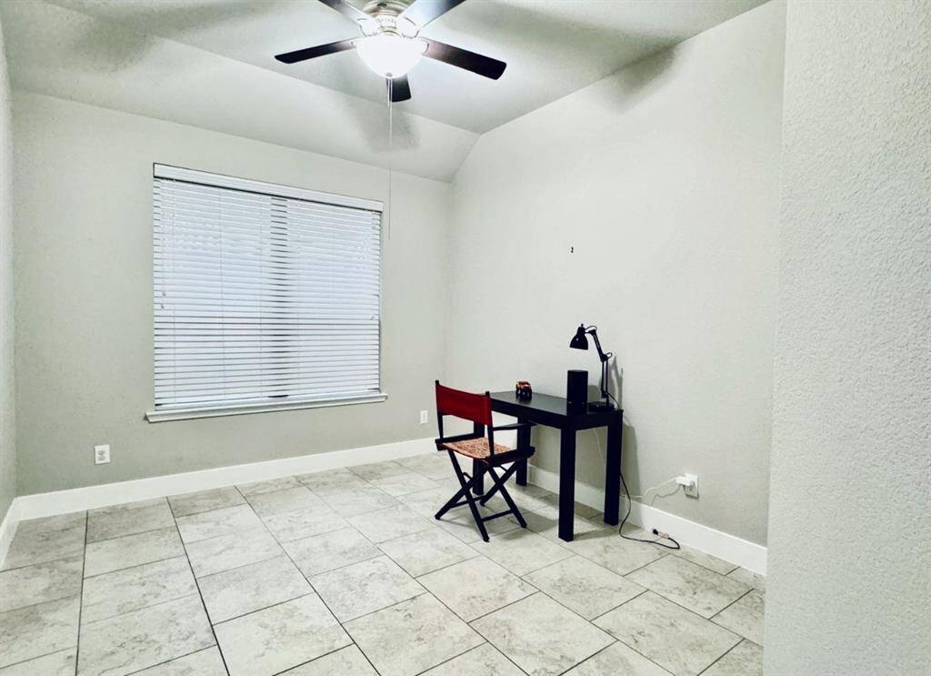 This versatile space is perfect for creating a cozy guest bedroom.