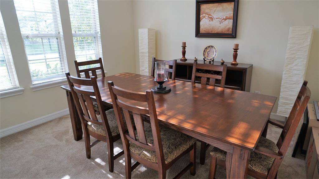 Study with French doors off front foyer can also be used as a formal dining room.