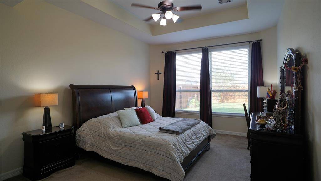 Master Bedroom down with recessed ceiling.