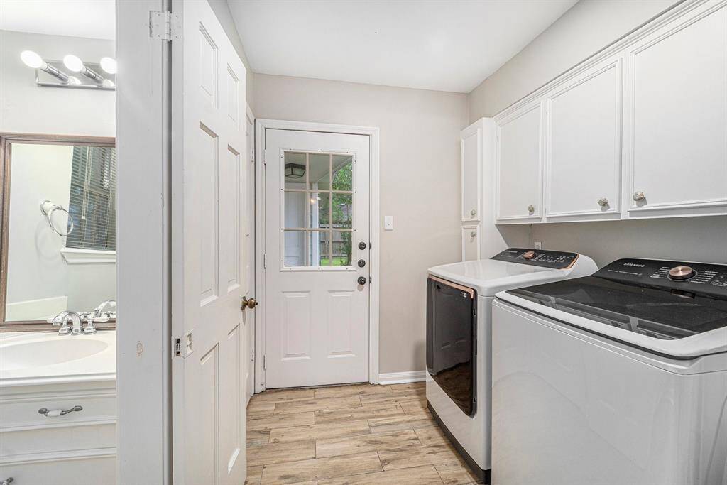 Large laundry room and half bath for guests
