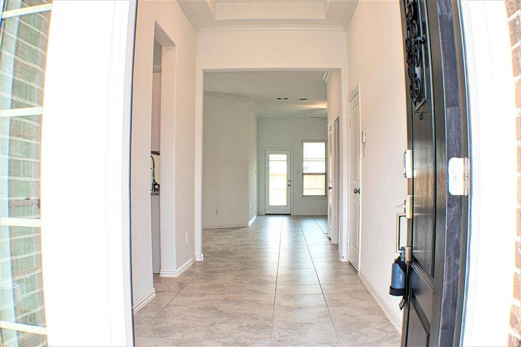 Fully tiled flooring throughout the Lennar-built home
