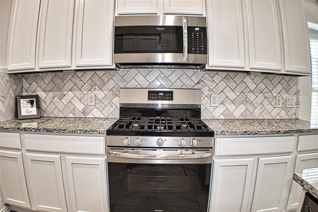 Five burner gas stove and microwave oven