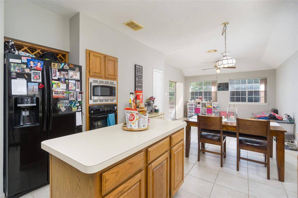 Lots of room in this kitchen open to large dining area