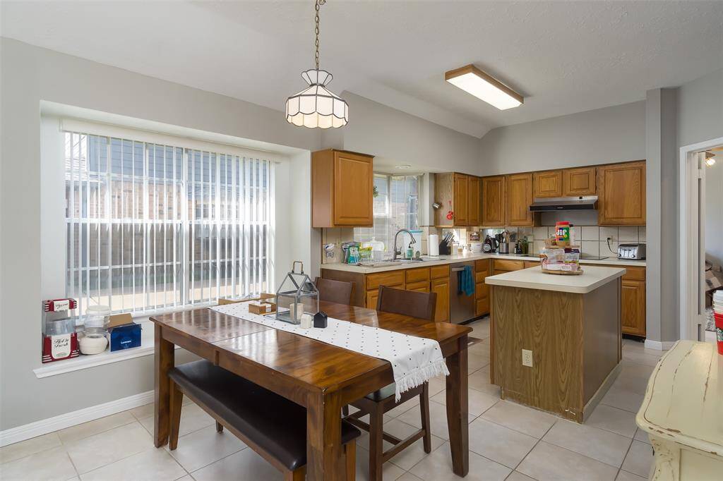 Dining opens to kitchen