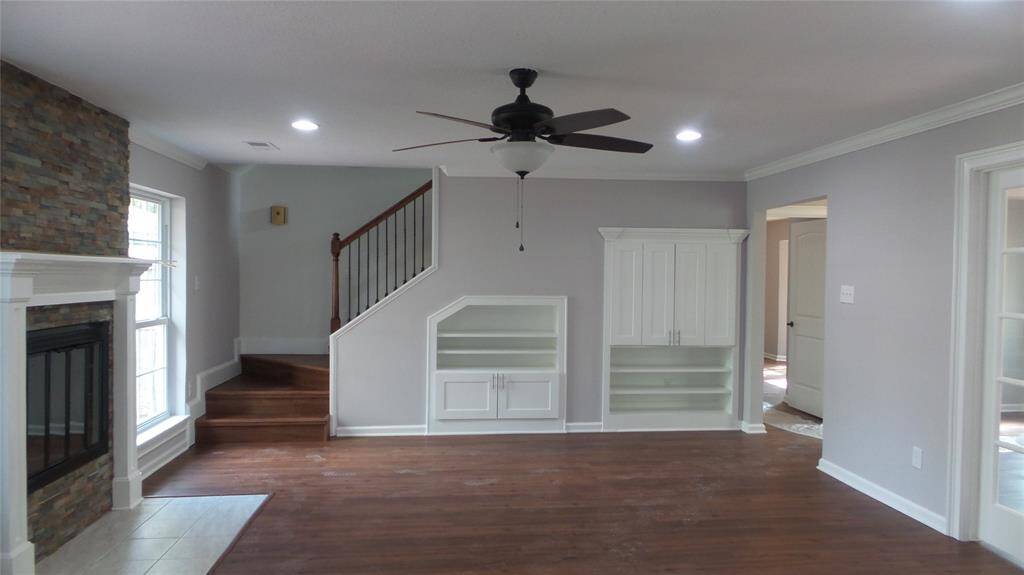 Large family room has plenty of cabinet space for your TV & Audio equipment.