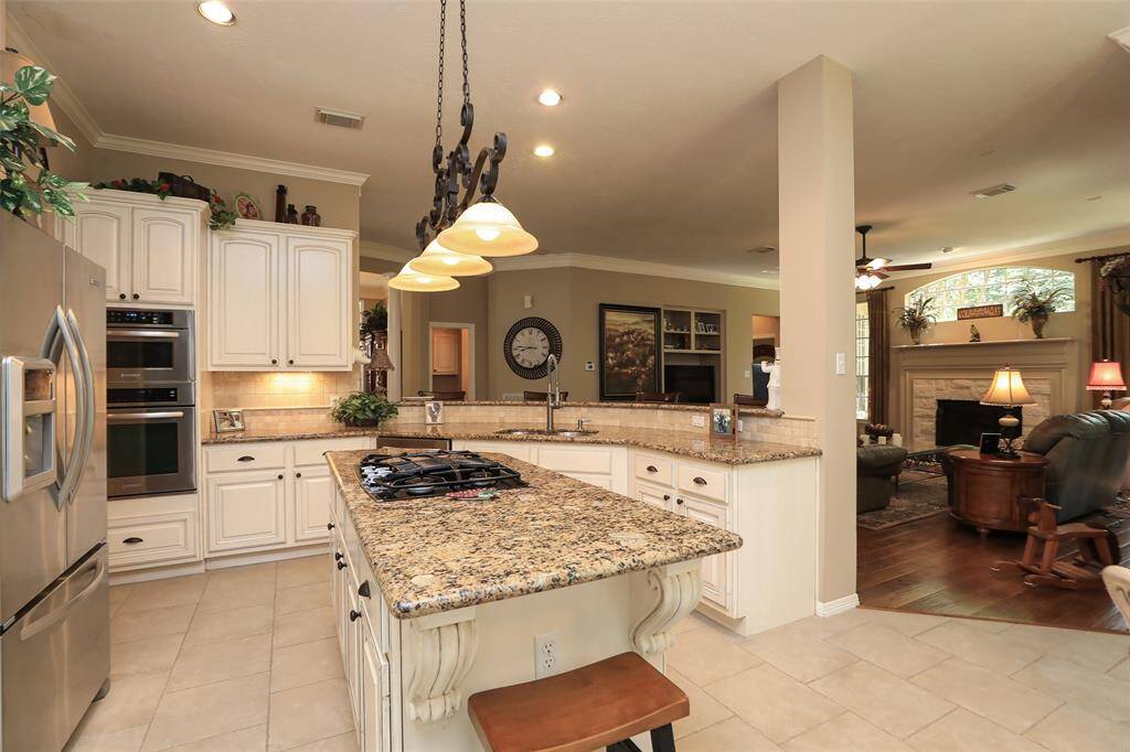 Updated granite, drawer pulls, stainless appliances and lots of counter space!
