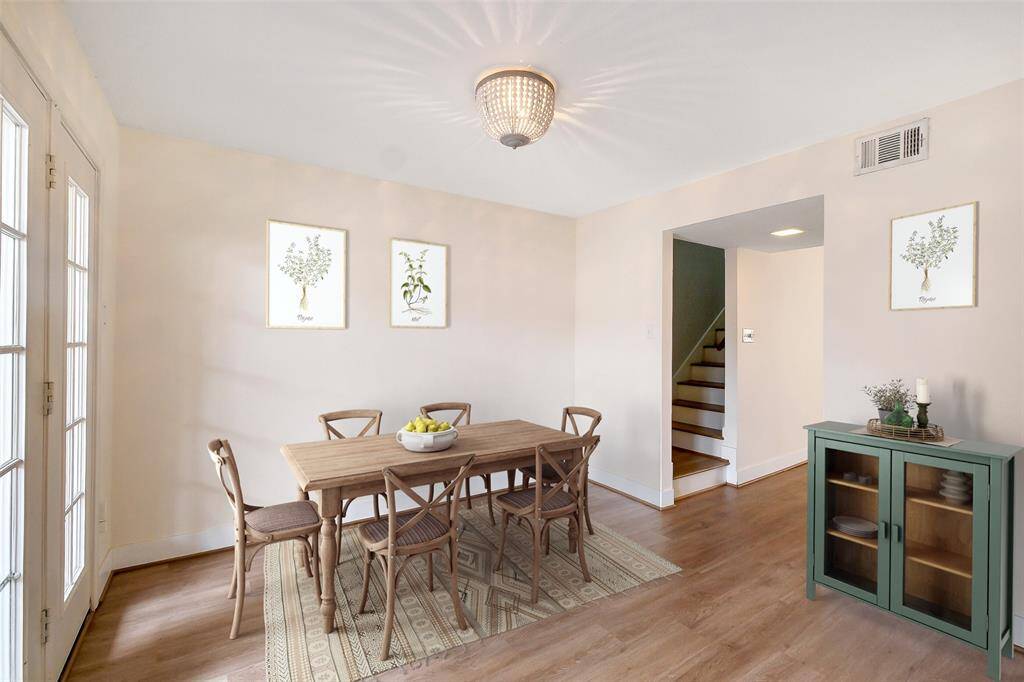 Breakfast room area off the kitchen perfectly situated for a great view of the patio/courtyard.Virtually Staged
