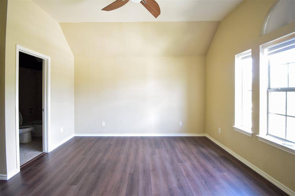 Upstairs guest suite with Hunter Douglas shades
