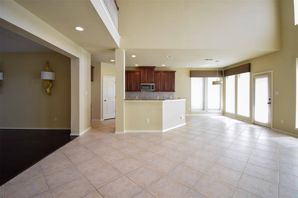 Soaring 18  ceilings and tile floors