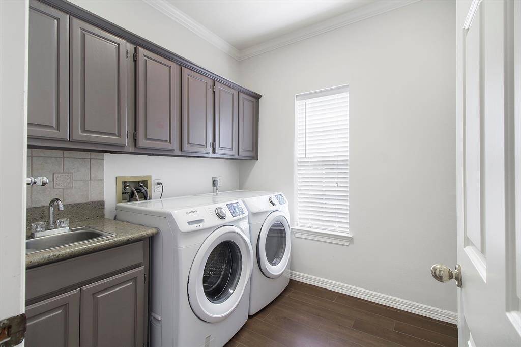 Laundry room. Washer & dryer included in the lease.