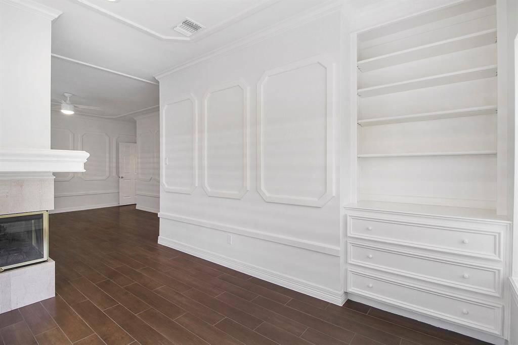Built-in storage in the primary bedroom living area.