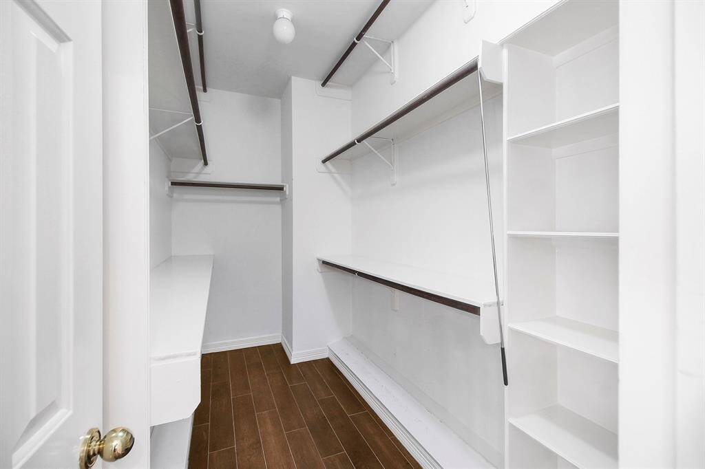 Walk-in closet in the primary bedroom.
