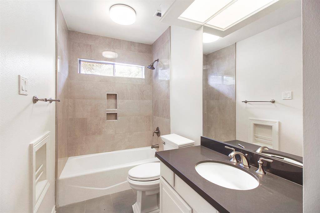 One of two bathrooms on the second floor which have been stylishly upgraded.