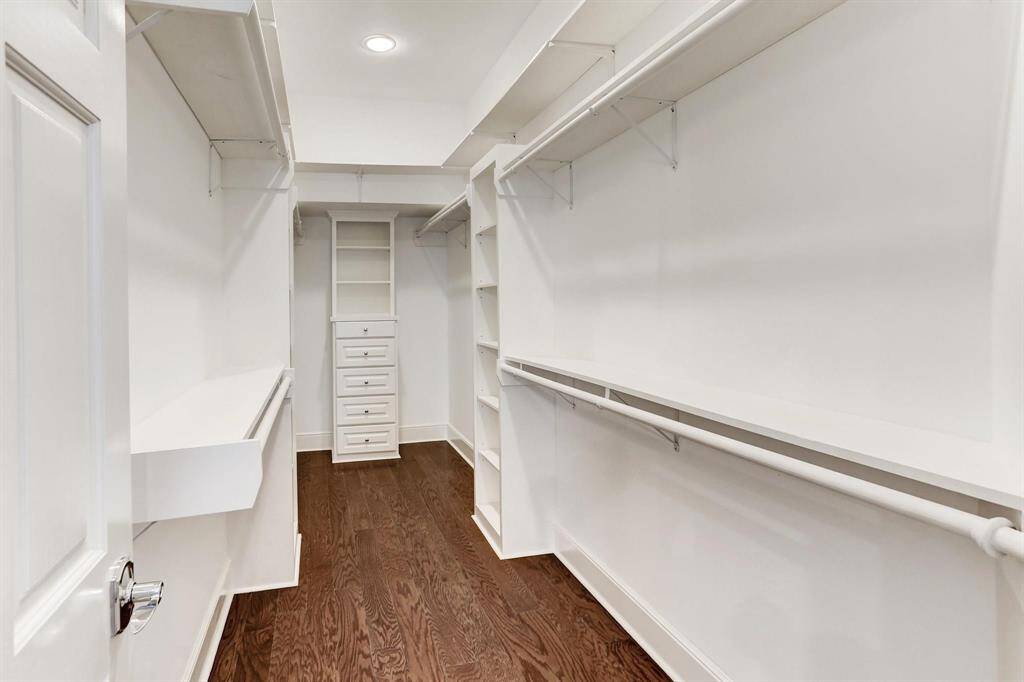 large walk in closet in master