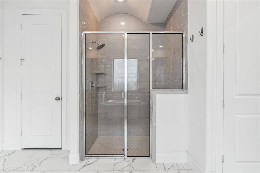 Walk in shower in primary bath.