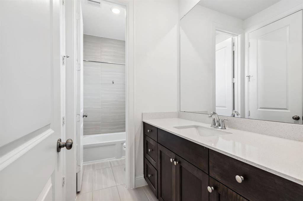 Full secondary bathroom downstair.  With shower / tub combo.