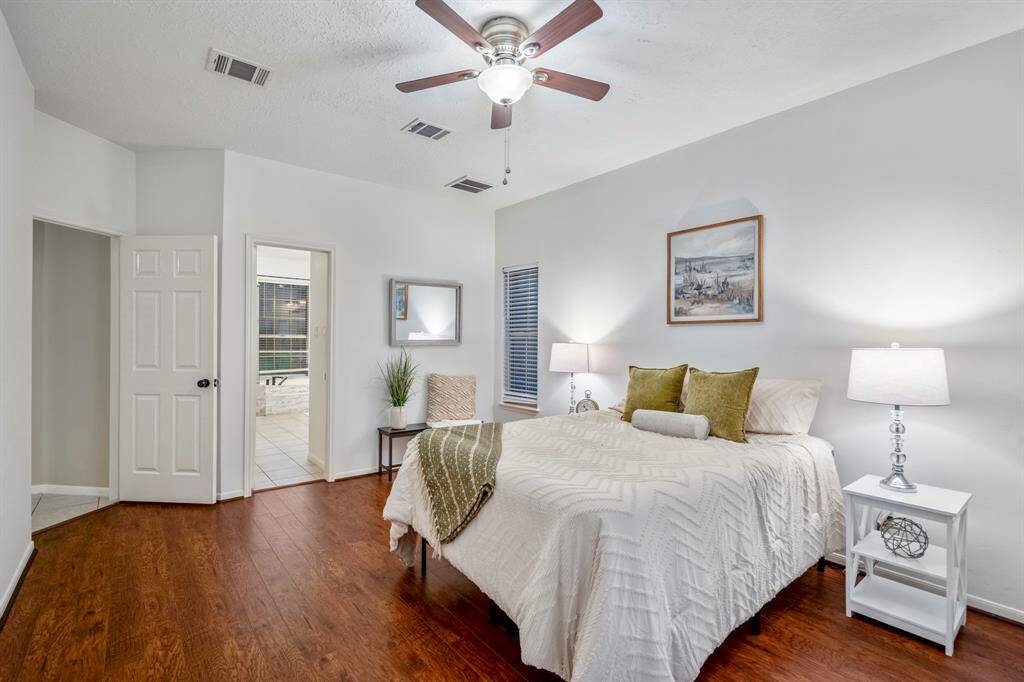 Your primary ensuite bedroom sets the tone for a relaxing retreat—spacious, serene, and ready to be your personal escape at the end of a long day.