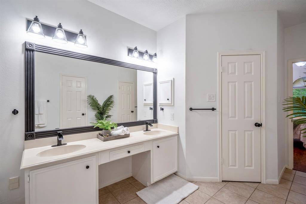 The primary ensuite features a luxurious soaking tub, separate shower, dual sinks, and not one—but TWO spacious closets. Because one just isn’t enough.