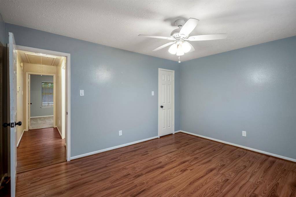 ay hello to bedroom number 3! Tucked away on the second floor, this room boasts a generous walk-in closet and stylish hard surface flooring—no carpet in sight, just easy living and modern vibes.