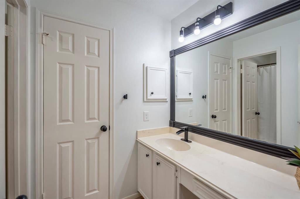 Take a look at the second full bathroom, located upstairs and thoughtfully designed with a separate shower and toilet area—perfect for added privacy and functionality.