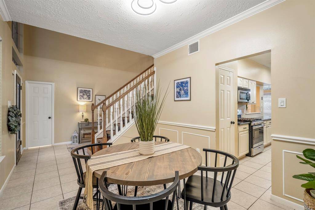The dining room sits just off the front foyer and offers plenty of space for everything from game nights to dinners with family and friends!