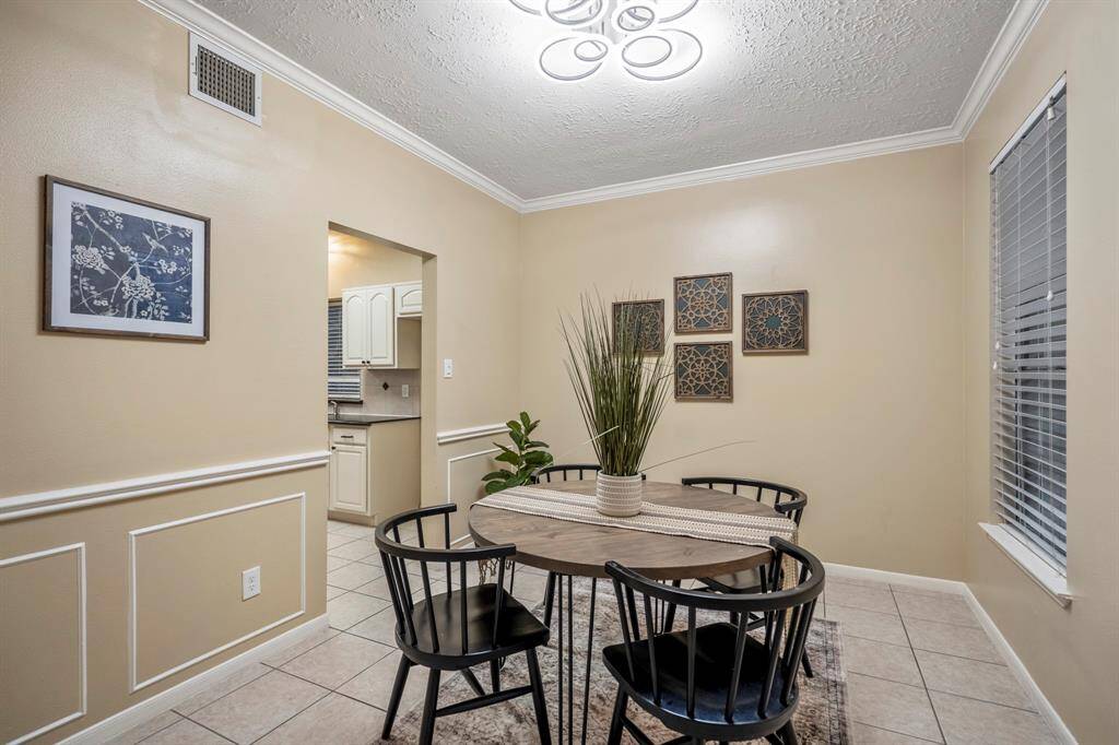 The dining room sits just off the front foyer and offers plenty of space for everything from game nights to dinners with family and friends!