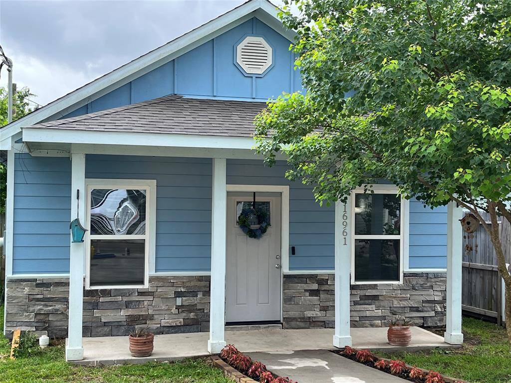 Charming blue home.