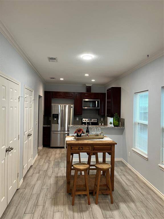 Open concept with living dinning and kitchen.