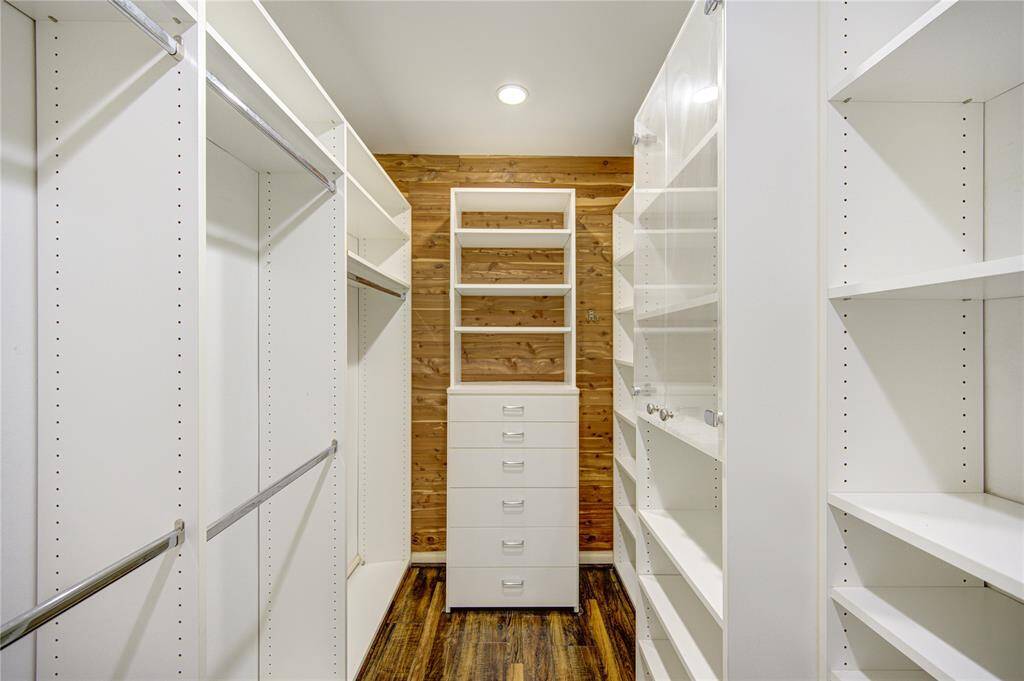 Primary bedroom w/ custom closet