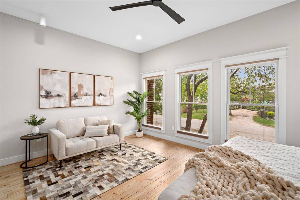 [Primary Suite] Tranquil sitting area with beautiful tree views