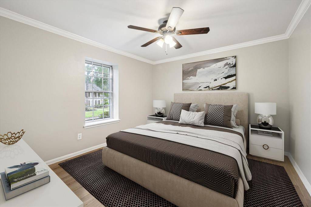 Secondary bedroom, nice size. No carpeting, all flooring is new in the home. Virtually staged.