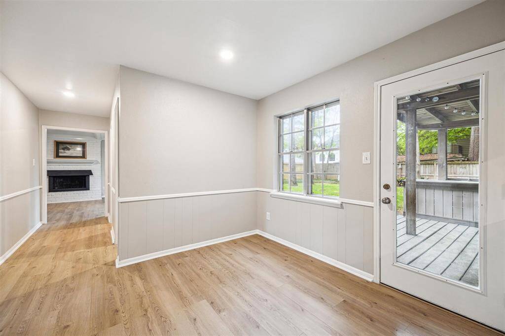 Breakfast room with views of the patio and back yard.