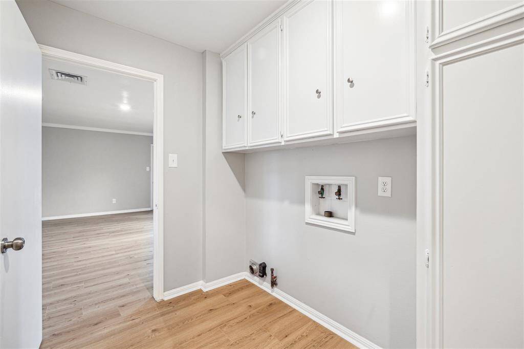 Laundry room off of the kitchen.