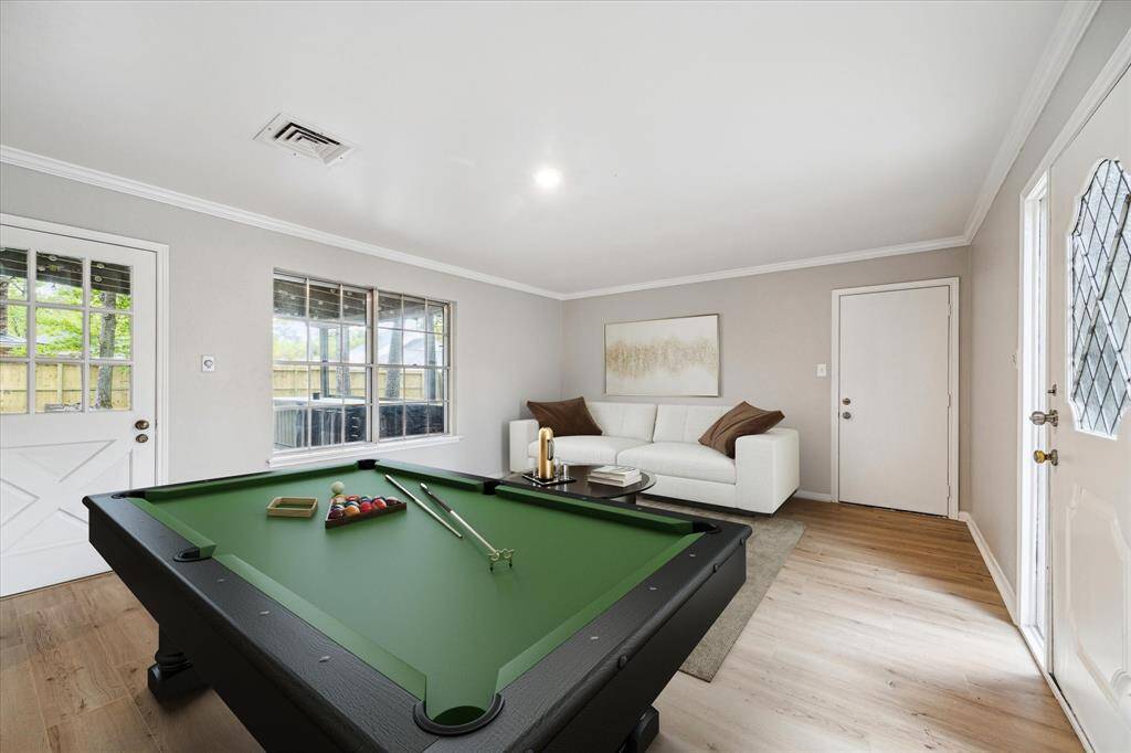 Game room or huge home office with private entrance on the first level. Virtually staged.