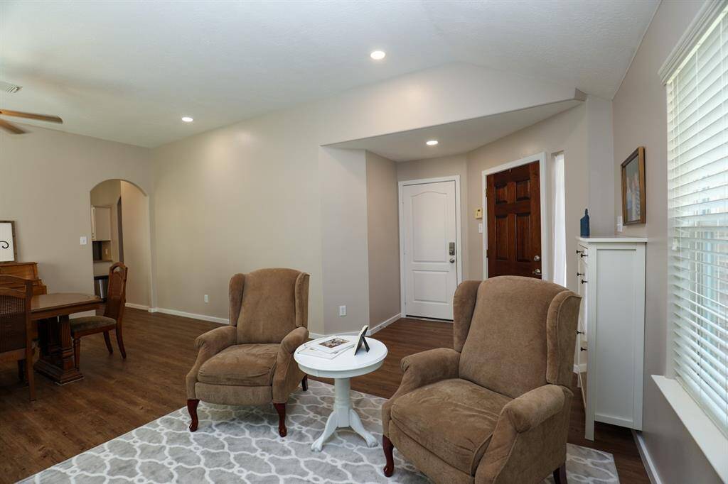 Notice how open the living and dining area are as you enter the home.