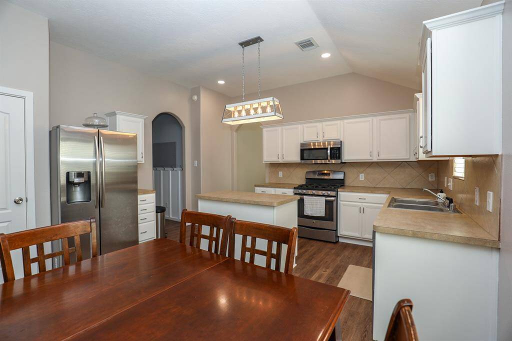 The kitchen has ample space for a dining area freeing up the formal dining for another use if needed.