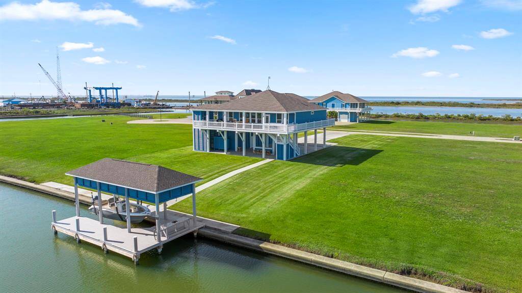 Enjoy this East Facing canal side - 360 views from the wrap around porch. Enjoy sunrises and sunsets.