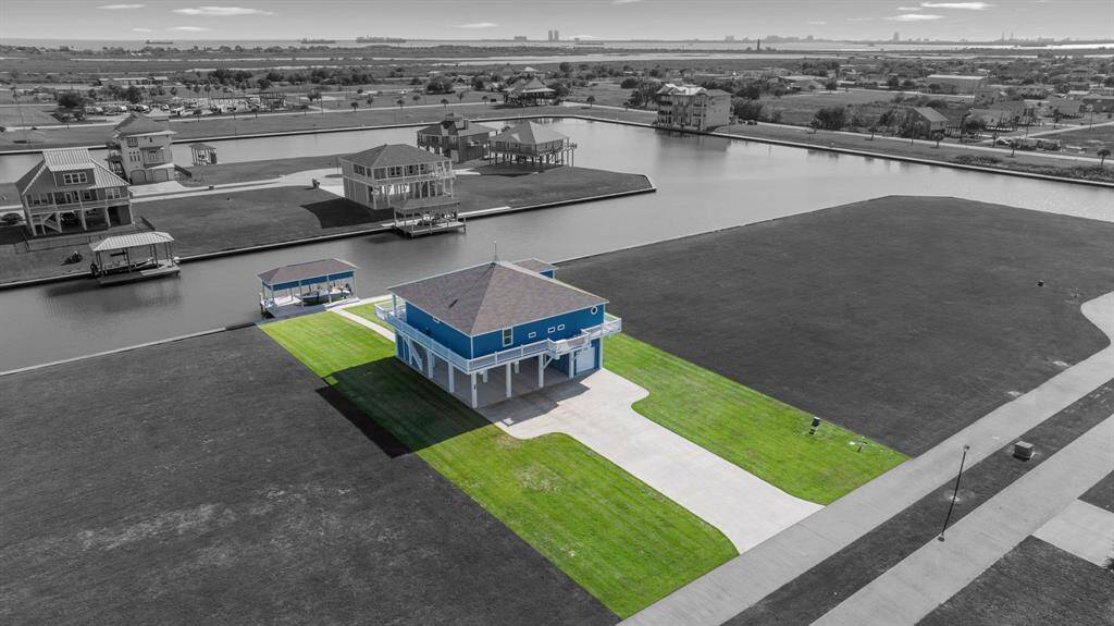 Situated on 1/2 an acre of waterfront property