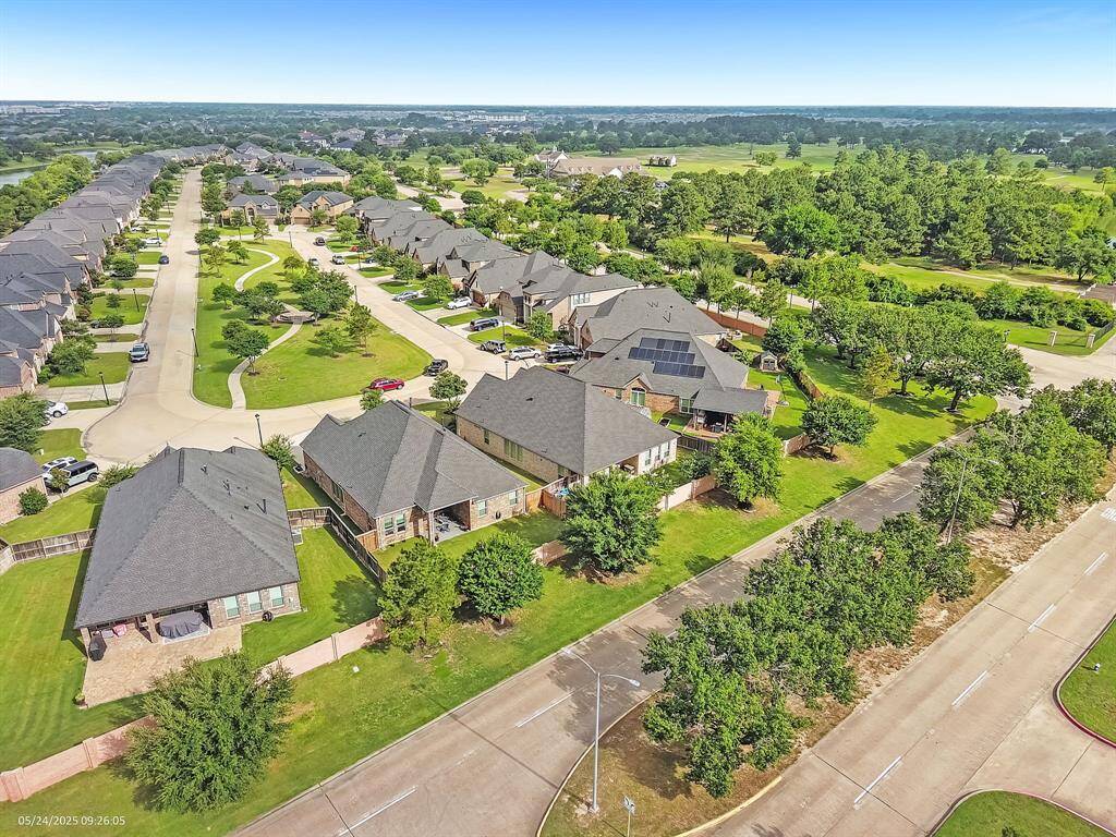 Nestled within the highly sought-after gated community of The Reserve – Villages of Cypress Lakes